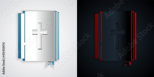 Paper cut Holy bible book icon isolated on grey and black background. Paper art style. Vector.
