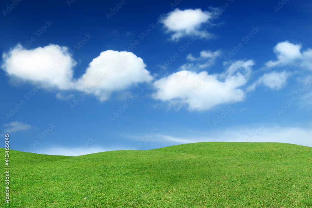 Idyllic view, green hills and blue sky
