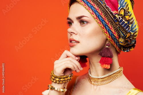 attractive woman in colorful mist decoration red background