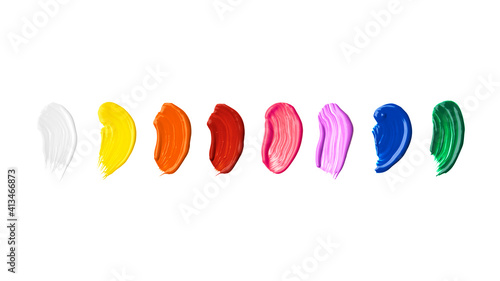 A set of multi-colored acrylic paint brush strokes isolated on a white background. Watercolour or oil set of multi-colored brush strokes on a white background.