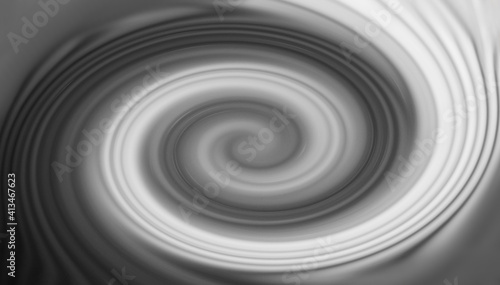 white spiral on a black background