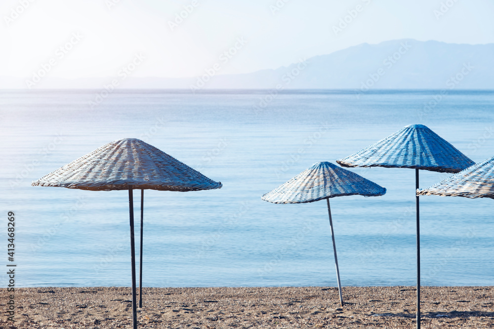 Fototapeta premium Bodrum Bitez Beach With Straw Umbrella - Aegean Sea. Retro Ä°mage