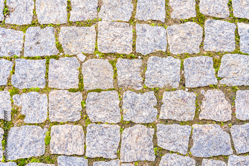 Granite paving stones on a walkway as a natural background