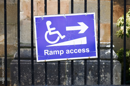 Ramp access for disabled wheelchair users sign at entrance