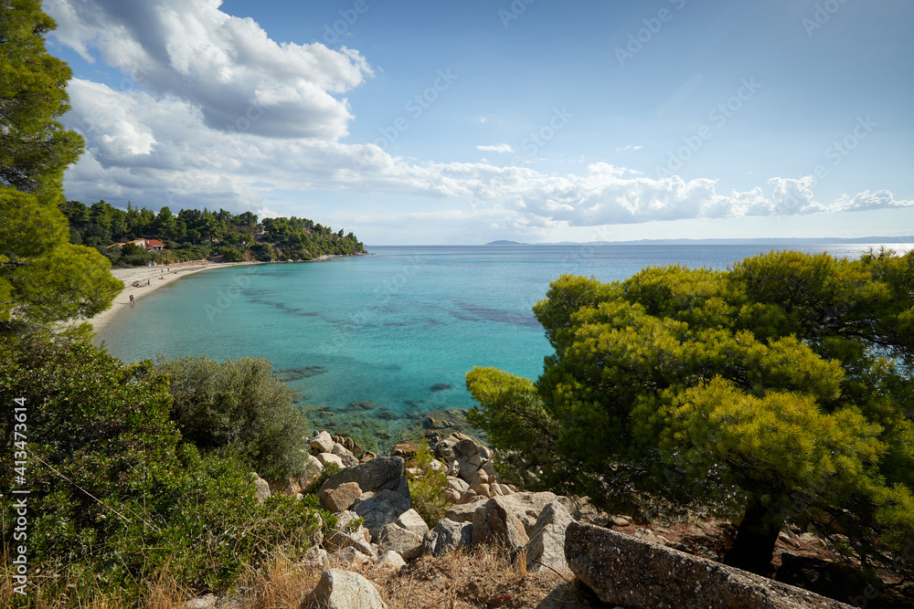 Seascape with sandy beach and  turquoise waters on Sythonia, Halkidiki Peninsula, Greece