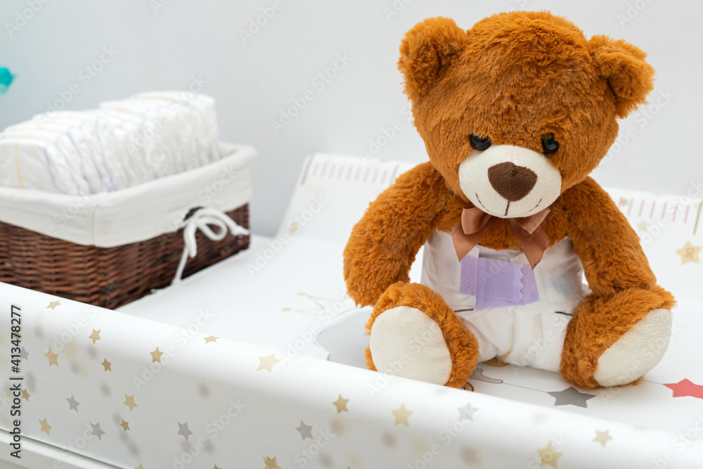 Teddy bear and diapers