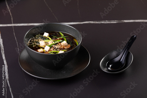 Miso soup, Japanese Food on black background photo