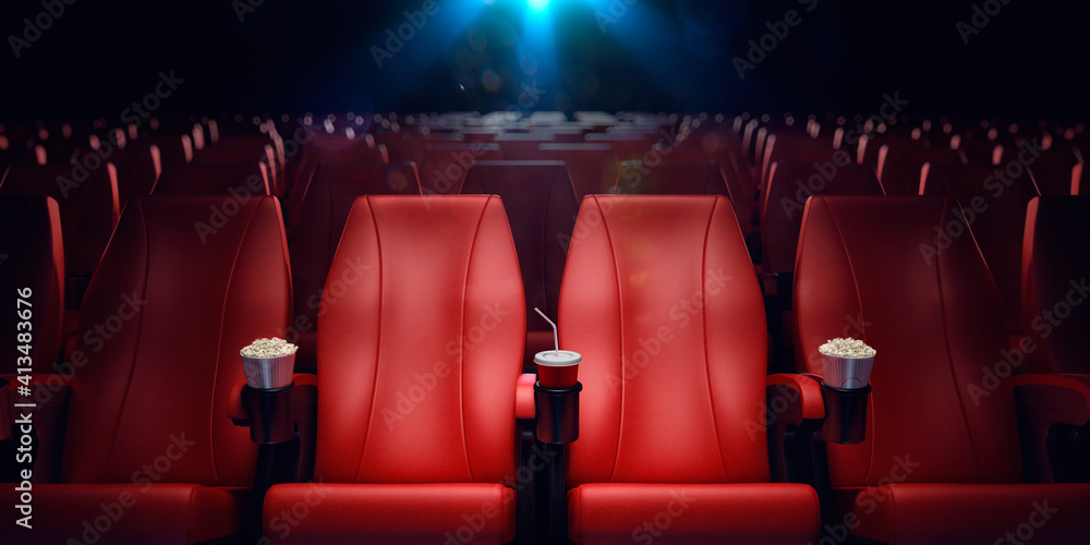 Empty movie theatre with red seat pads Empty movie theatre with red seat pads