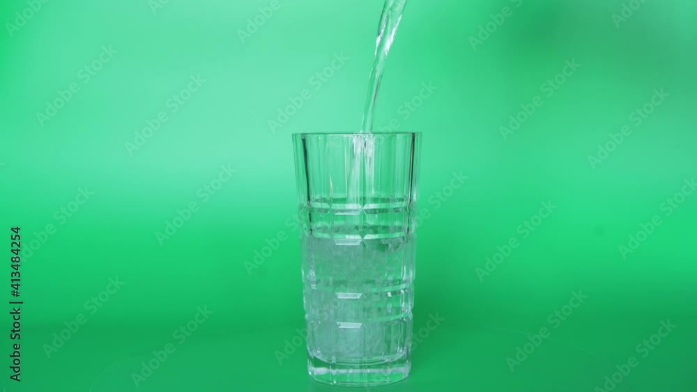 Greenscreen Closeup: Filling a Glass with Water Greenscreen Closeup: Filling a Glass with Water