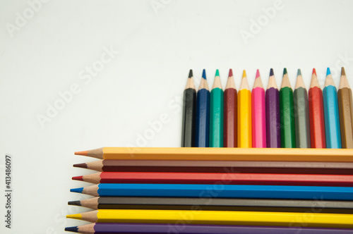 colored pencils on a white background. education concept. illustration of training.