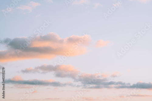 A soft evening sky with clouds.