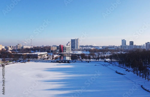 Top view of snowy city park in winter