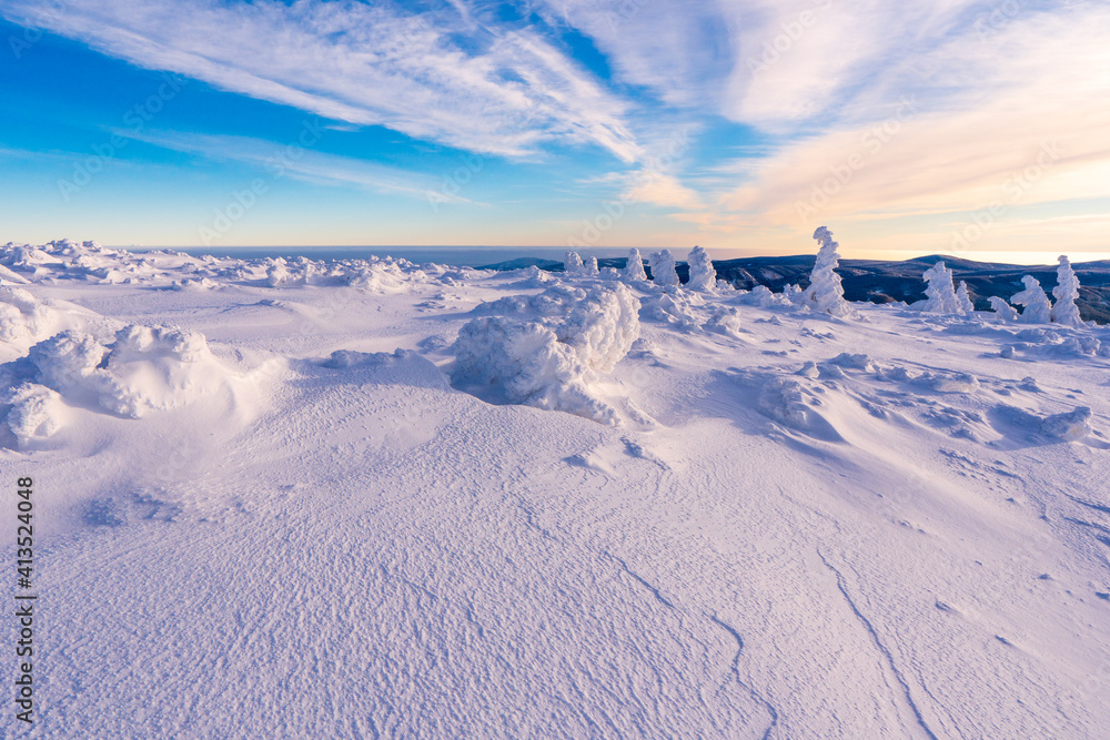 Snow hills with blue sky in winter time. Composition of nature. Snow hills with blue sky in winter time. Composition of nature.