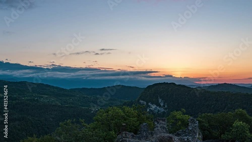 Wallpaper Mural Beautiful sunrise over wild forest mountains in summer morning in nature, Time lapse Torontodigital.ca