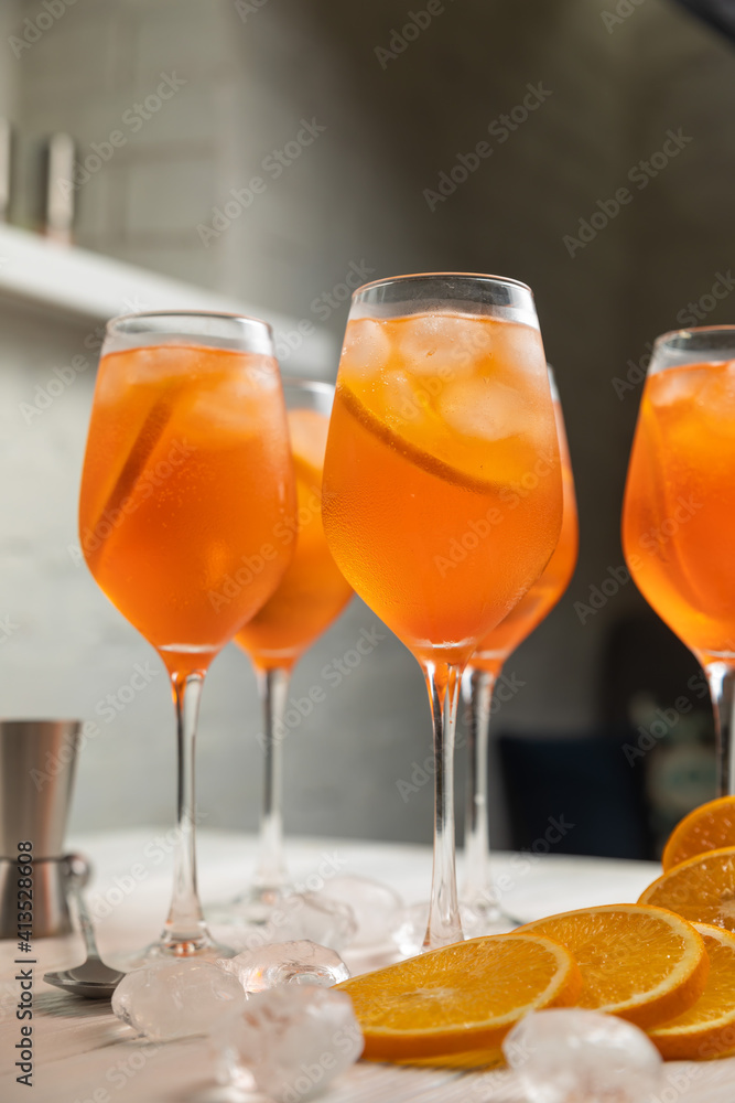 aperol on a white wooden table
