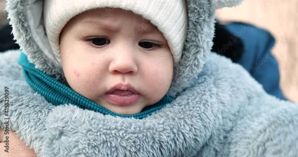 Happy mother playing with little son . Young caucasian mom and baby boy having fun outdoor in winter. slow motion Happy mother playing with little son . Young caucasian mom and baby boy having fun outdoor in winter. slow motion