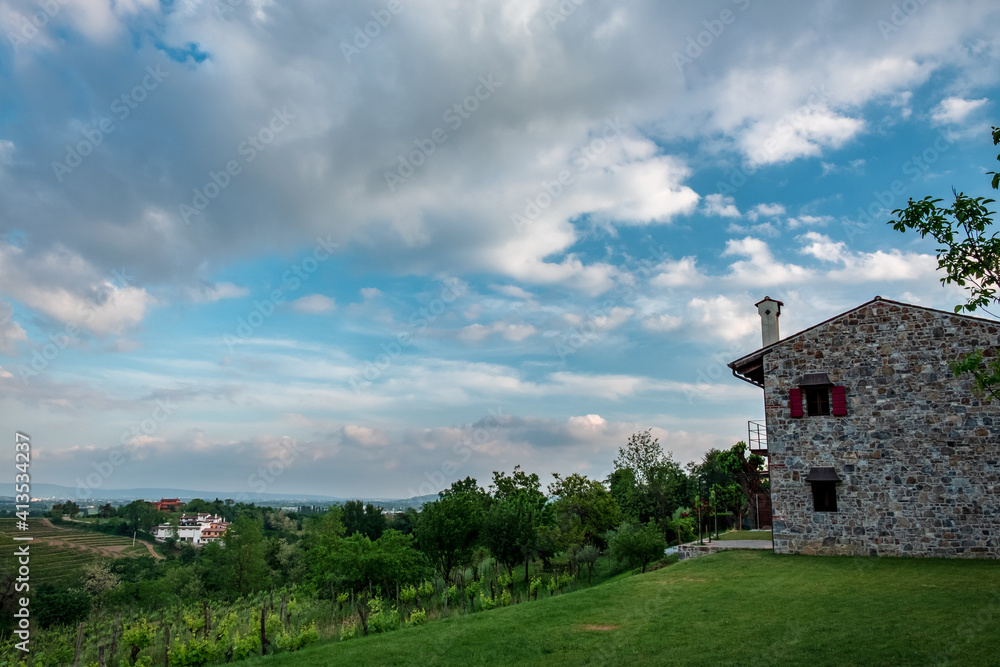 Spring stormy sunset in the vineyards of Collio Friulano, Friuli-Venezia Giulia, Italy Spring stormy sunset in the vineyards of Collio Friulano, Friuli-Venezia Giulia, Italy