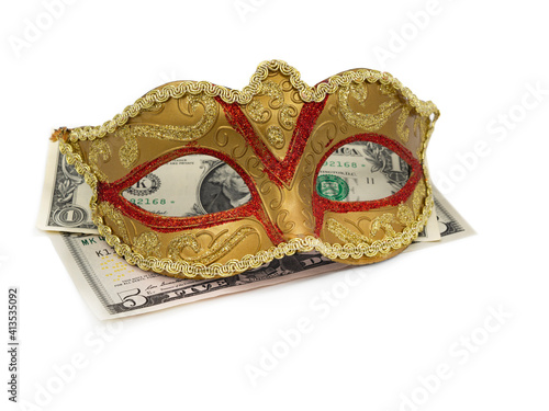 Traditional Brazilian carnival or festival mask with money (dollar bills) on a white background. The concept of anonymous money transactions.