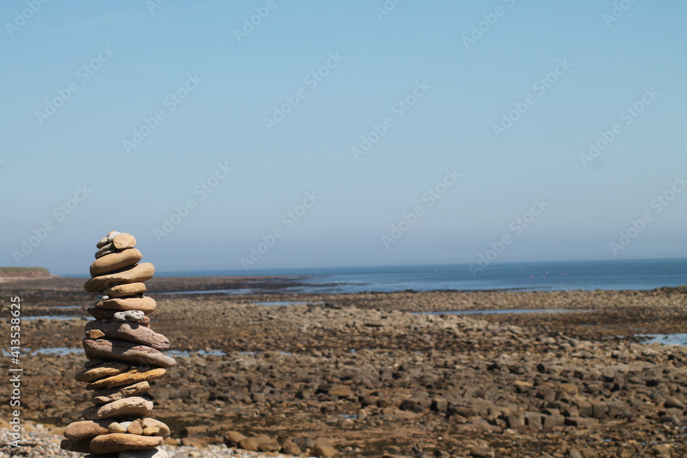 Fototapeta premium stack of stones on the beach