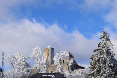 Nürburg im Schnee bei leichten Wolken photo