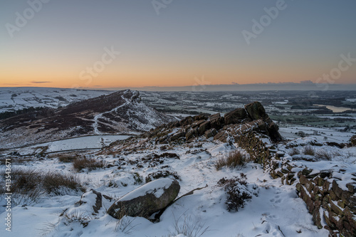 Fototapeta Naklejka Na Ścianę i Meble -  Hen Cloud winter sunrise and snow at The Roaches, Staffordshire.