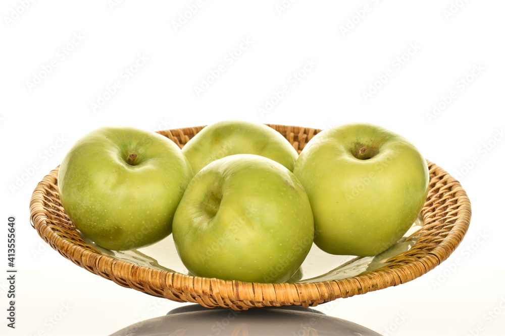 Several sweet green apples by Renet Simirenko with a ceramic plate, close-up, isolated on white. Several sweet green apples by Renet Simirenko with a ceramic plate, close-up, isolated on white.