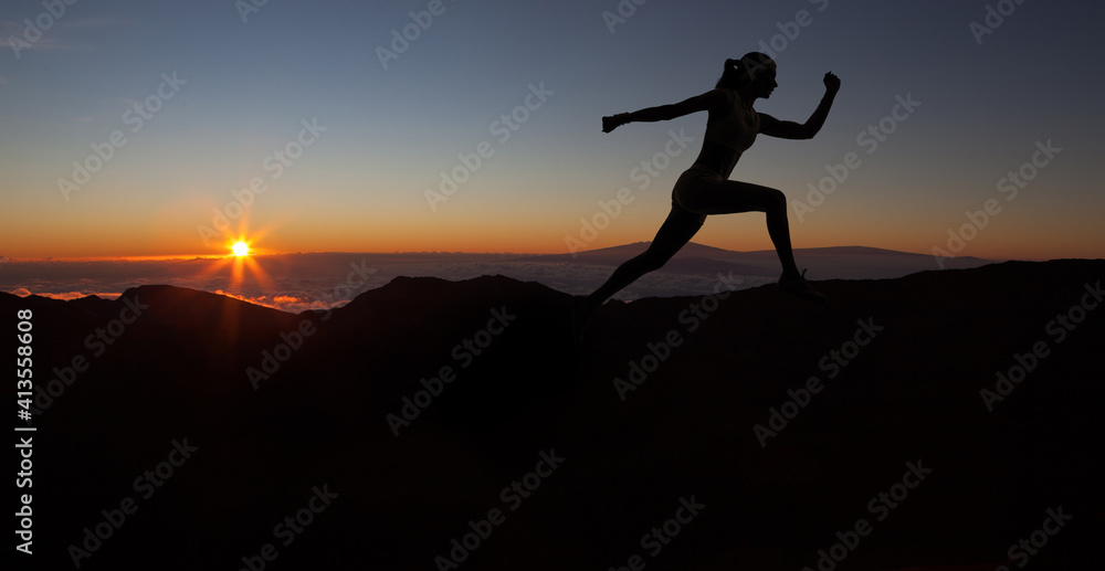 Runner during sunset - fitness work out concept