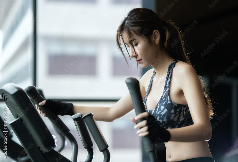 Soft focus consept women are exercising in gym fitness. Beautiful women in good shape from taking care of their bodies. Health concept. Soft focus consept women are exercising in gym fitness. Beautiful women in good shape from taking care of their bodies. Health concept.