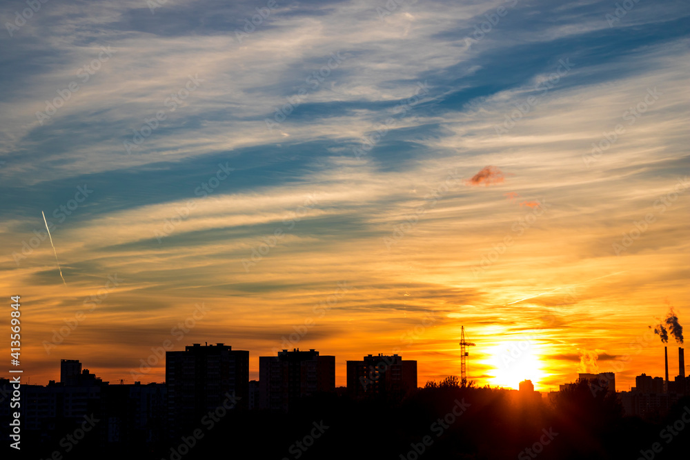 Townscape with clouds on sunset, nature background Townscape with clouds on sunset, nature background
