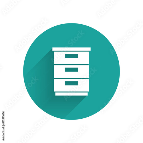 White Furniture nightstand icon isolated with long shadow. Green circle button. Vector.