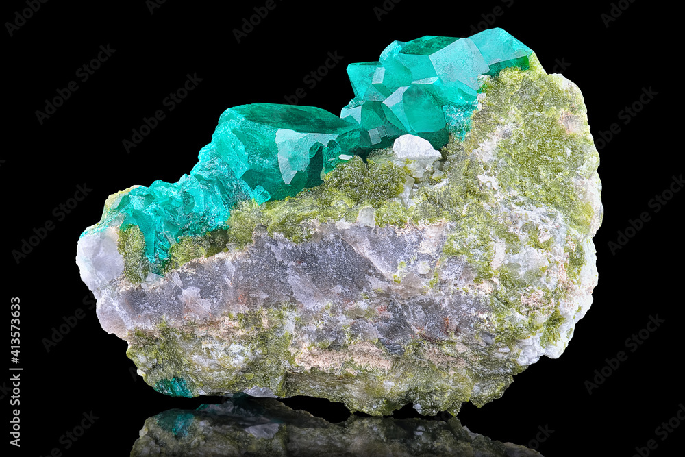 Amazing closeup macro of natural mineral stone - Dioptase (copper emerald or silicate copper) on black background. Rare specimen of emerald-green crystals . Altyn-tube details Amazing closeup macro of natural mineral stone - Dioptase (copper emerald or silicate copper) on black background. Rare specimen of emerald-green crystals . Altyn-tube details