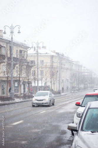 Snowy road. cold snow in the city.