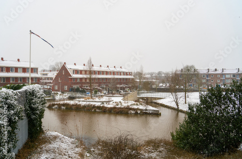 Street scene while snowing in Amersfoort, Netherlands
