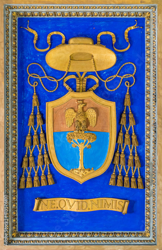 Bishop emblem on the ceiling of the Basilica of San Nicola in Carcere in Rome, Italy.