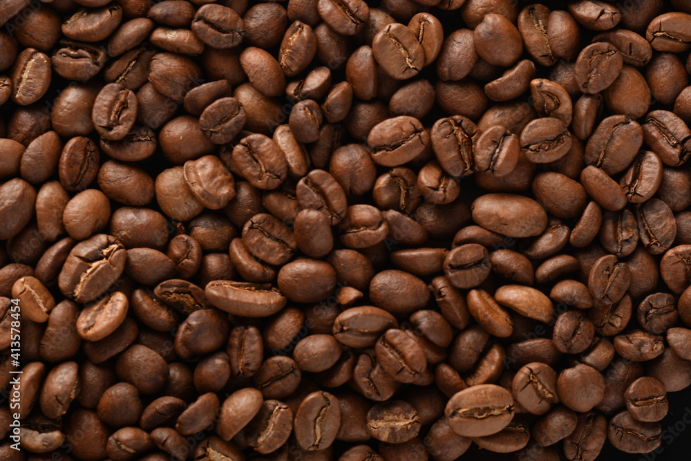 TOP VIEW: Close Up of Roasted coffee beans.
TOP VIEW: Close Up of Roasted coffee beans.