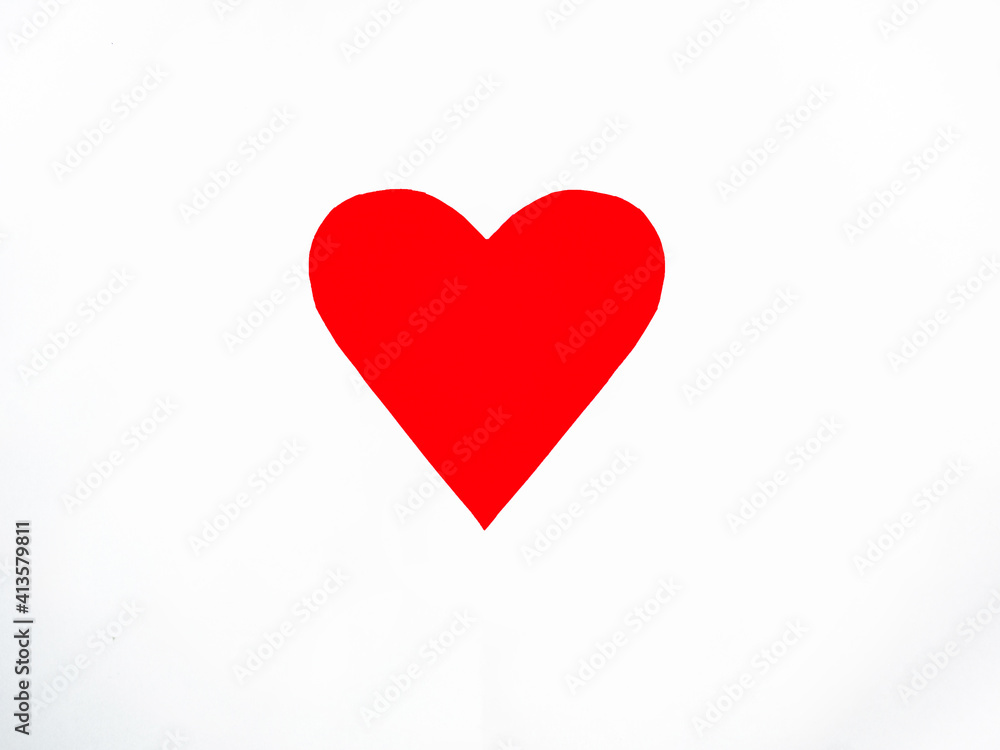 A red heart-shaped perforated white paper A red heart-shaped perforated white paper