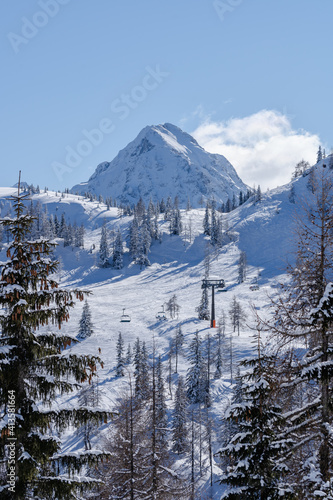 Winter view in a ski resort in Austria on a sunny day