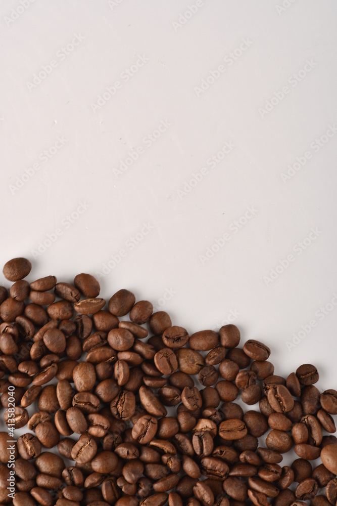 Coffee beans isolated on white background with copy space for text. Coffee background or texture concept. Coffee beans isolated on white background with copy space for text. Coffee background or texture concept.