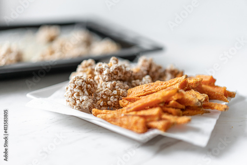 Rice Puffs Chicken Nuggets and Baked Sweet Potatoes, Flat Lay