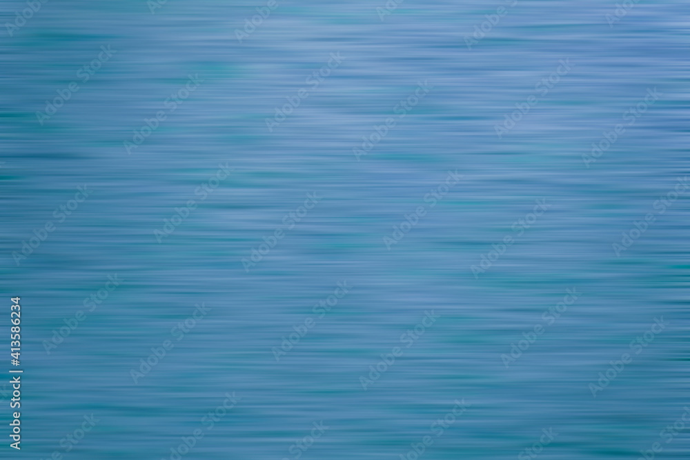 Naklejka premium Blurred blue background water, lake, sea.