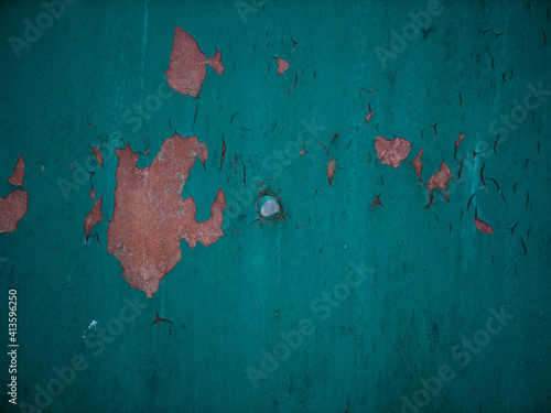 texture of old cracked blue paint on wooden board