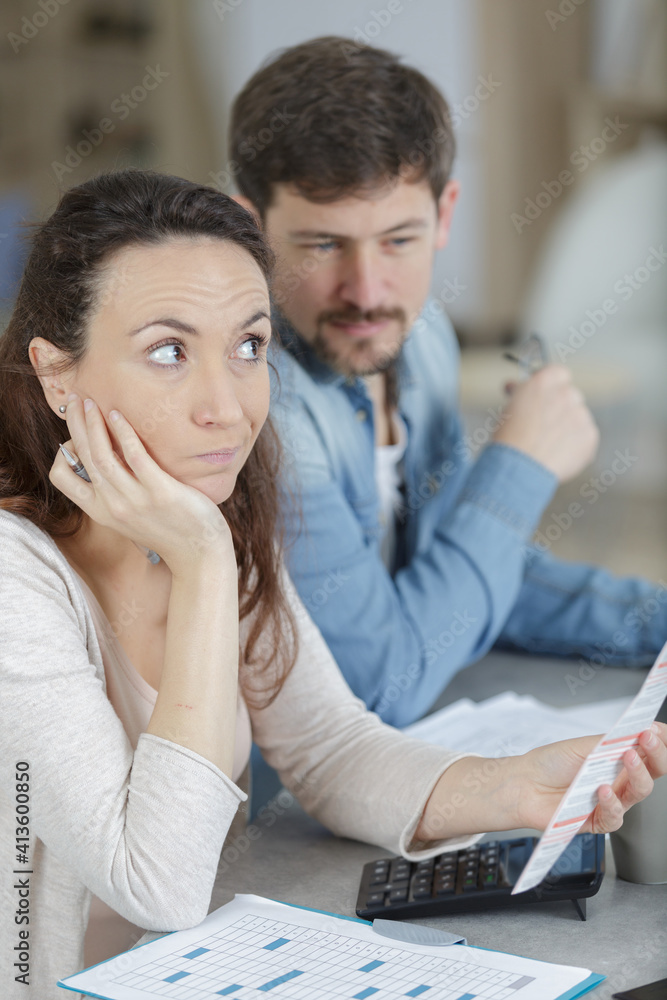 worried couple in the living room worried couple in the living room