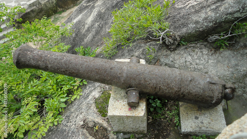 Xiamen, Fujian, China - April 6 2013: Abundant cast iron cannon at Hulishan Cannon Fort  photo