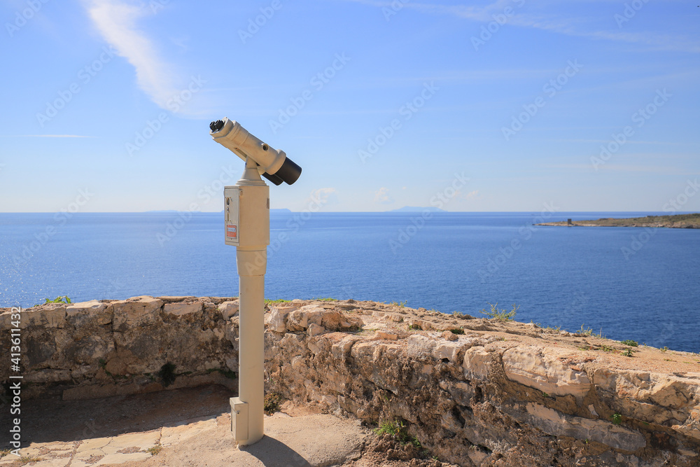 Sightseeing binoculars on the castle at Porto Palermo Sightseeing binoculars on the castle at Porto Palermo
