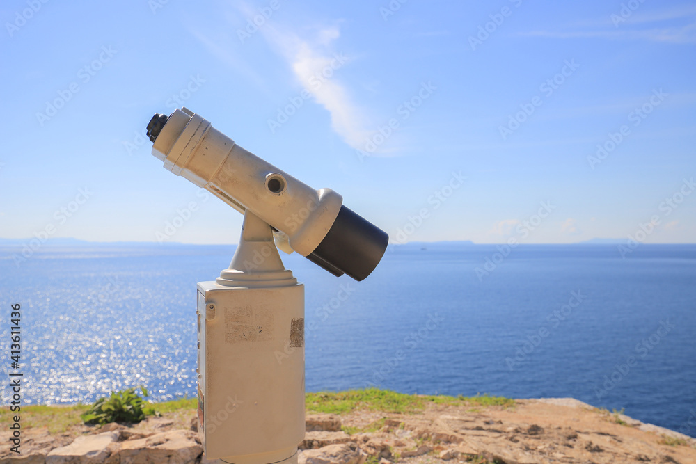 Sightseeing binoculars on the castle at Porto Palermo