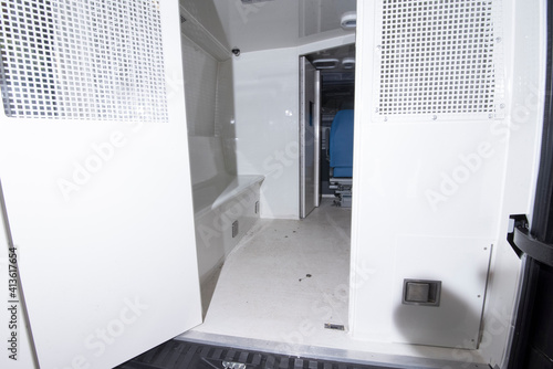 the inside of a prisoner transport car photo