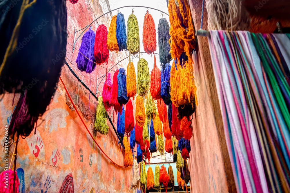 Fototapeta premium Goods on display for sale in the souks of Marrakech Morocco.
