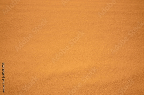 Abstract colored background. Colored sand snow texture as background.