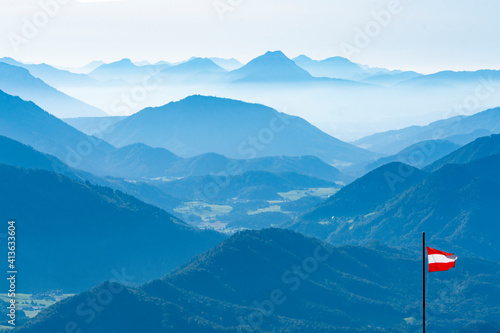 Austria flag on background majestic mountain view from