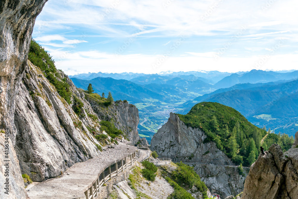 Obraz premium Equipped hiking path in the mountains. A beautiful summer